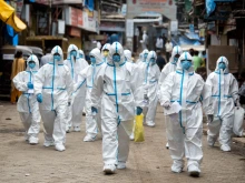 June 25, 2020: Health workers arrive at a check-up camp in Malad